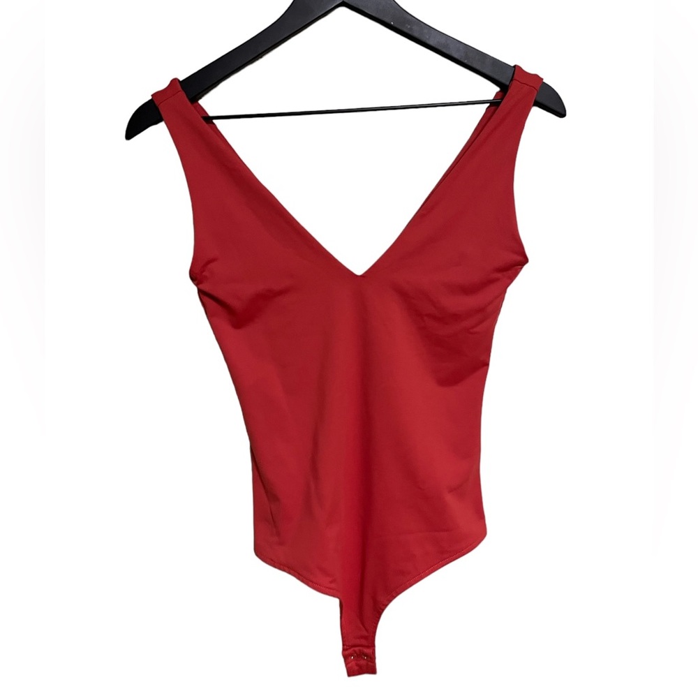 Reo Ria size small clay red
